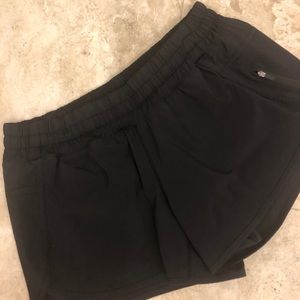 Lululemon Black Tracker Shorts 4” long Size 12